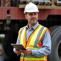 Safety Manager inspecting a truck's safety systems